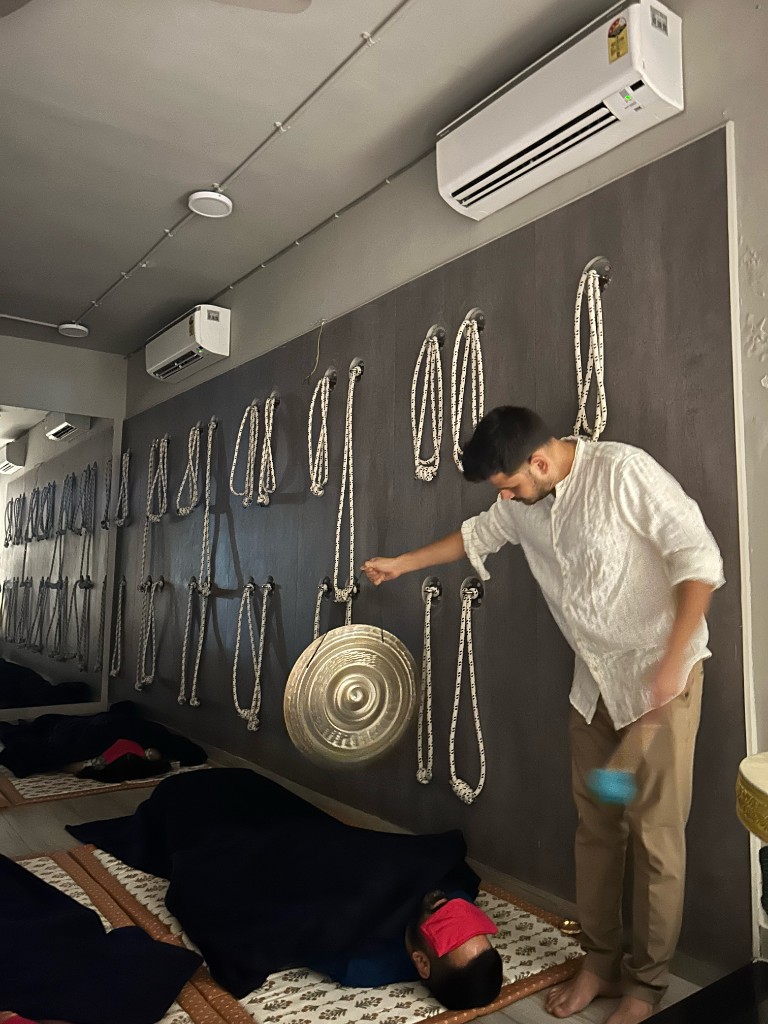 Shubham Ranka striking the gong